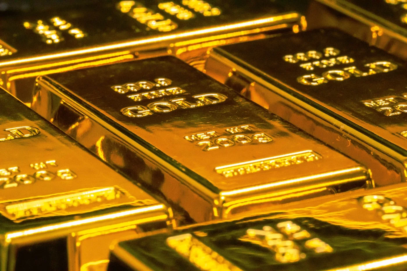 Vàng thỏi minh họa cho giá vàng giao ngay tăng lên vùng 4.344,77 USD/oz - DXY lợi suất Mỹ và vàng